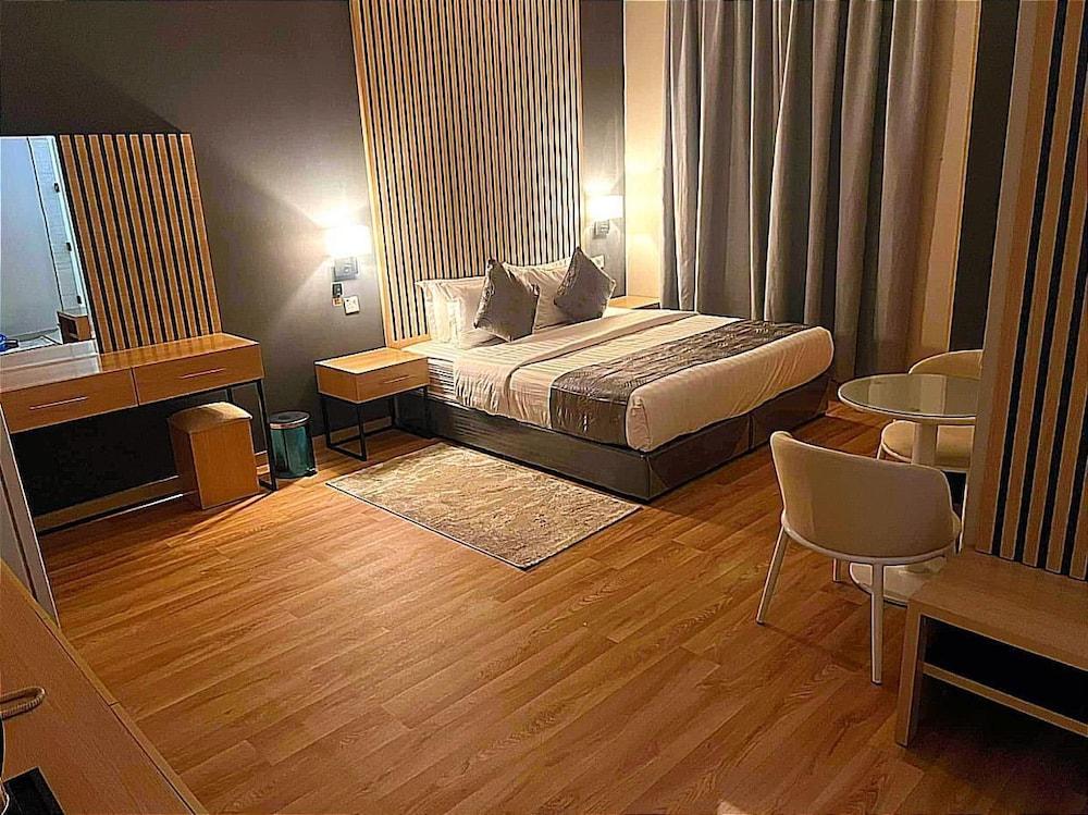 Happiness Suites Serviced Apartments