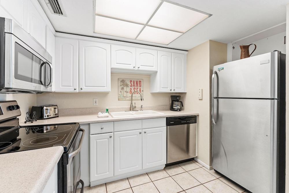 Crescent Arms by Beachside Management