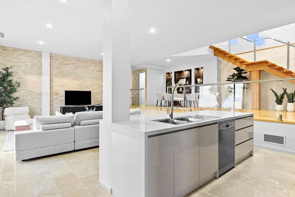 Cliffside Castle With Bay And City Views