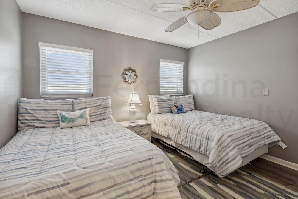 Amelia South 2 Bedroom Condo by RedAwning